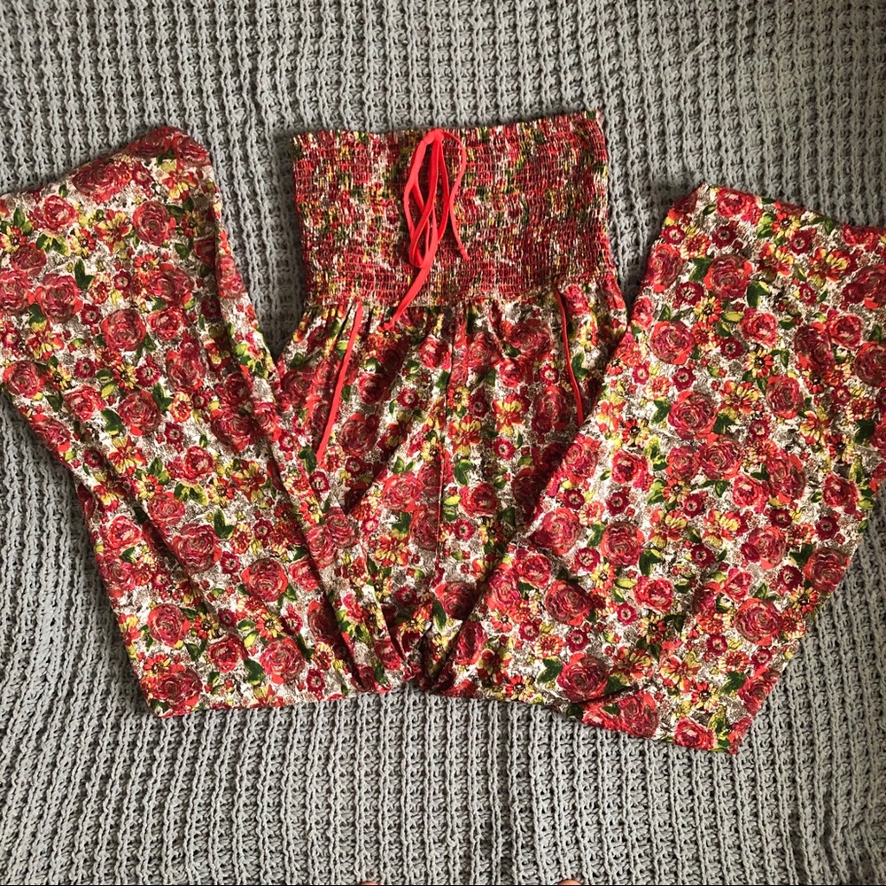 Red / orange floral flair leg jump suit